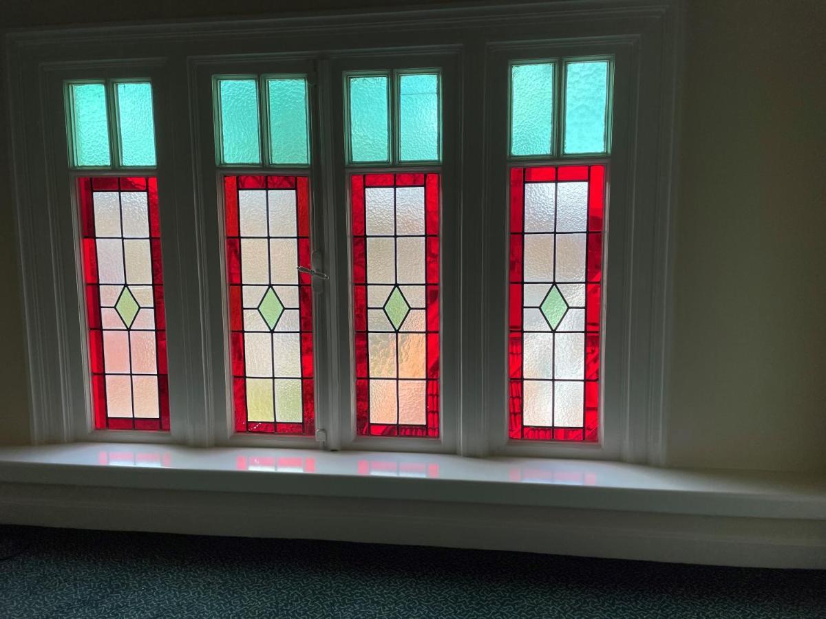 Hotel Restaurant Stad Munster Winterswijk Exterior photo Stained glass windows in the sanctuary