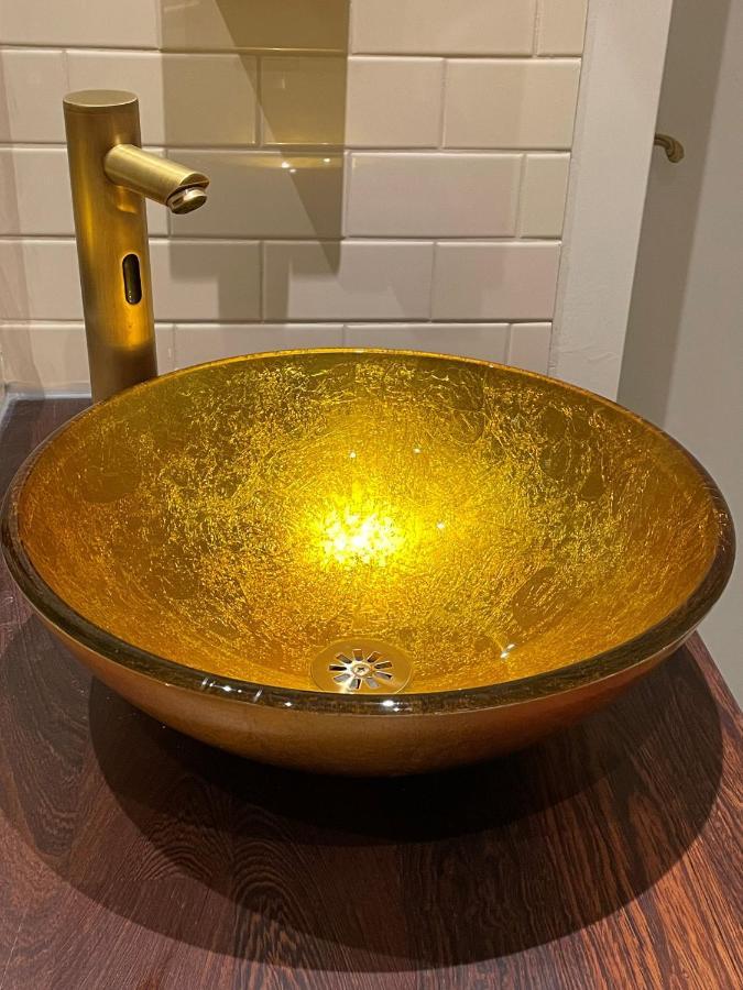 Hotel Restaurant Stad Munster Winterswijk Exterior photo A gold sink